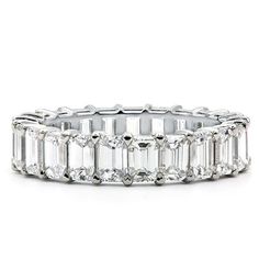 a white gold band with baguetts and diamonds