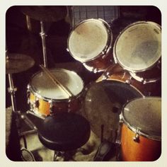 a drum set up on top of a table