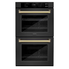 two black ovens side by side with gold trim