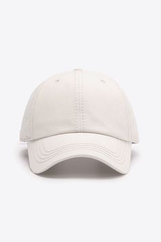 a white baseball cap on a white background