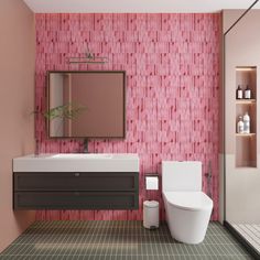 a bathroom with pink wallpaper and a white toilet next to a sink in front of a mirror