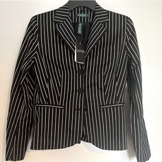 Msrp: $345 This Beautiful Pinstripe Blazer Is Black With Beige Pinstripes. Featuring Three Buttons (That Adorn "Lauren Ralph Lauren") And Real Pockets This Jacket Is A Sleek Addition To Your Wardrobe. The Shell Is 90% Cotton And 10% Silk. The Lining Is 100% Acetate. Measurements (Lay Flat) Armpit To Armpit: 18" Length: 22.5" Shoulder: 15.25" Arm Length: 24" Waist: 16.5" Tags: High-End, Luxury, Classic, Preppy, Wear To Work, Work From Home, Meeting Pinstripe Blazer, Classic Preppy, Wear To Work, Blazer Black, Work From Home, Black Tan, Black And Tan, Lauren Ralph Lauren, Lay Flat