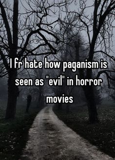 a dirt road with trees and fog in the background that says if hate how paganism is seen as evil horror movies