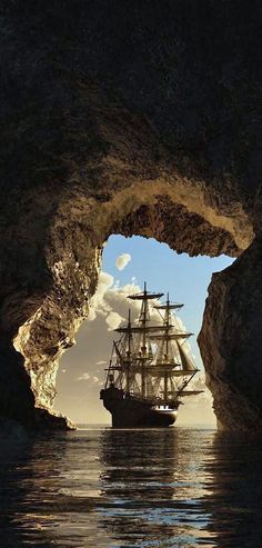 a pirate ship sailing through an opening in the ocean