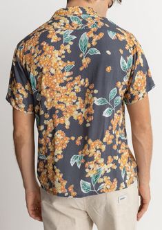 The Isle Floral Cuban Short Sleeve Shirt is perfect for your summer and vacation wardrobe. Featuring a classic fit, seasonal yardage print, and a Cuban collar, this shirt will transport you to warm and sunny days. The 100% Rayon construction and rhythm trims add comfort and style. Perfect for layering or wearing on its own. Cuban Shirt, Cuban Shirts, Cut Clothes, Thermal Sweater, American Jeans, Beanie Style, The Isle, Vacation Shirts, Active Wear Leggings