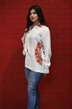 A stunningly marvellous Top. This Shirt Top features Multi-Colour Kashmiri Aari embroidery on Collar and shirt Pocket.- - - - - - - - - - - - - - - - - - - - Product Details- Condition: Brand New (made to order)- Brand: Glancia by Angad Creations- Style: Shirt Top- Fabric: Monga Cotton- Base Colour: White- Embroidery: Kashmiri Thread Embroidery- Embroidery Colour: Multi-Color- Standard Length: 27" (69 cm) approx. | Can be Customized - Care Instructions: Dry Clean Only**If you want the top to be Women Tunic, Hippie Top, White Cotton Shirt, Pashmina Wrap, Embroidered Shirts, Shirt Pocket, Aari Embroidery, Hippie Tops, Bohemian Women