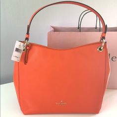 Nwt Coral Kate Spade Kat Shpulder Bag. Orange Satchel With Gold-tone Hardware For Shopping, Orange Shoulder Bag With Gold-tone Hardware For Shopping, Designer Kate Spade Bag With Leather Handles, Elegant Orange Shopping Bag, Elegant Orange Bag For Shopping, Elegant Orange Shoulder Bag With Leather Handles, Luxury Kate Spade Shoulder Bag With Leather Handles, Kate Spade Bucket Bag With Detachable Strap, Kate Spade Shoulder Bag With Gold-tone Hardware For Errands