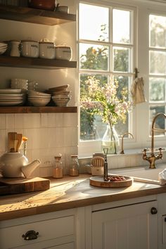 the kitchen counter is clean and ready to be used for cooking or baking, as well as dishes