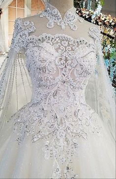 a wedding dress on display in a store