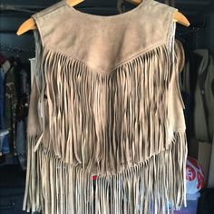 A Pristine Vintage Vest By One Of The Top Leather Wear Manufactures Around. This Tassel Vest Looks Brand New. Ready For That Lady To Sit On A Harley And Go For A Cruise. Beautiful Suede Tassels With No Damage At All. Fall Beige Fringe Top, Fitted Beige Outerwear For Festivals, Tassel Vest, Vest Looks, Coats Vintage, Vintage Vest, Suede Tassel, Leather Wear, Tassels