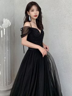 Black V-neck Gown For Banquet, Black Fitted A-line Gown, Fitted Black A-line Gown, Black Fitted Bodice Dress For Prom, Black Dresses With Fitted Bodice For Prom Season, Black Dress With Fitted Bodice For Prom, Black Gown For Banquet During Prom Season, Black A-line Gown For Formal Events, Black A-line Gown For Formal Occasions