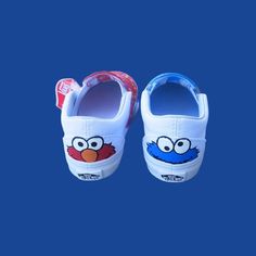 a pair of children's shoes with an angry bird on them