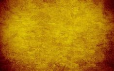 an old grungy yellow background with some black spots