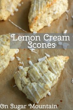 lemon cream scones with white icing and sprinkles on parchment paper