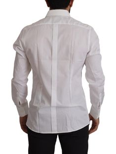 DOLCE & GABBANA Absolutely stunning, 100% Authentic, brand new with tags Dolce & Gabbana GOLD cotton dress shirt. The model has a classic neck, long sleeves and a button down closure. Model: Dress shirt Fitting: Slim fit Material: 100% Cotton Color: White Front button closure Logo Details Made in Italy