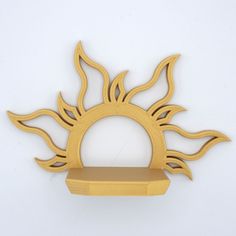 the sun is made out of wood and sits on a shelf