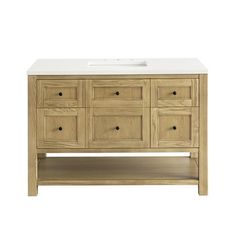 a bathroom vanity with drawers and a white counter top on the bottom, against a white background