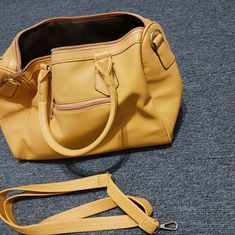 Nwt. Length Is 14.5 In, Width Is 6.5 In, Height Is 9 In. Measurements Are Approximate. Comes With Additional Longer Strap. Nice Detailed Studs On One Side. Mustard Yellow Color. Vegan Leather. Casual Yellow Satchel Affordable, Yellow Purse, Mustard Yellow Color, Yellow Purses, Source Unknown, Mustard Yellow, Yellow Color, Vegan Leather, Mustard