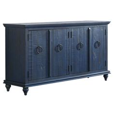 a blue cabinet with three doors and two drawers on one side, in front of a white background