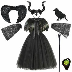 a dress with black feathers and horns on it, including an angel's wings