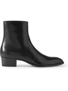 Find SAINT LAURENT Wyatt Leather Chelsea Boots Eu 39 on Editorialist. SAINT LAURENT revisits its cult 'Wyatt' boots each season, this pair is designed with Western-inspired stitched vamps for a polished feel. They've been crafted in Italy from supple leather and have elongated, pointed toes and stacked heels. Designer Snip Toe Boots For Fall, Designer Ankle Boots With Leather Lining, Designer High Ankle Boots With Leather Sole, Designer Almond Toe Boots For Fall, Cowboy Chelsea Boots, Wyatt Boots, Leather Chelsea Boots, Stacked Heel, Chelsea Boots