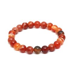 Carnelian Agate 10 MM bracelet, Red Carnelian Onyx bracelet, Healing crystals stretchable round bead bracelet, Carnelian beaded bracelet Stone: Banded Carnelian Agate Shape: Round smooth beaded  Size of bead: 10 mm Quality of Stone: AAA+ Type of band: Stretchable elasticc *comes in a velvet pouch Description: Adorn your wrist with the vibrant energy of our Carnelian Bracelet, a tribute to the fiery hues of passion and vitality. Crafted from genuine carnelian beads, each stone exhibits warm tones Carnelian Beaded Bracelets For Healing, Beaded Carnelian Bracelets With Natural Stones, Carnelian Beaded Bracelets With Natural Stones, Round Carnelian Beaded Bracelets With Natural Stones, Carnelian Natural Stones Beaded Bracelets, Beaded Round Carnelian Bracelets, Red Carnelian Beaded Bracelets With Round Beads, Red Carnelian Beaded Bracelets, Beaded Round Carnelian Bracelet