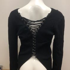 Donna Karan Black Sweater Brand New With Tags And Never Been Worn. Cross Cross Lace Up Back Gothic Winter Sweater, Fitted Casual Sweater For Night Out, Gothic Tops For Winter Night Out, Black Gothic V-neck Top, Gothic Tops For Night Out In Winter, Gothic Black V-neck Top, Edgy V-neck Top For Winter, Gothic Tops For Night Out In Fall, Edgy Fitted Sweater For Spring