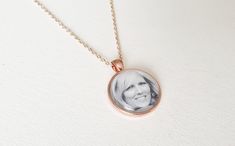 ♥ Heavenly Hangers ♥ Beautiful rose gold necklace with pendant - pendant is fully customisable with your own photo or quote. The necklace measures 60cm in length. Your pendant comes with your loved ones photo sealed to glass, so that it is an everlasting keepsake. The photo area in each round photo pendant measures 25mm in diameter. * * * * * * * * * * * * * * * * * * * * * * * * * * * * * * * * * * * * * * * * * * * * * * * * * * * * *  ORDERING: Please kindly provide the photo(s) via an Etsy m Gold Necklace With Pendant, Photo Area, Memorial Pendant, Photo Charms, Photo Pendant, Necklace Pendants, Wedding Keepsakes, Wedding Item, Beautiful Rose