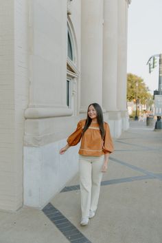 This Camel Detailed Long Sleeve Blouse is the perfect piece to elevate your Fall wardrobe. The camel color and flowy design bring a touch of elegance while the rounded neckline and 3/4 puff sleeves add a touch of femininity. Dress it up or down for any occasion and feel confident and stylish. runs true to size with flow model, Jade is wearing a size small Brown Fall Blouse For Day Out, Brown Blouse For Day Out In Fall, Brown Blouse For Fall Day Out, Camel Long Sleeve Tops For Spring, Brown Blouse With Blouson Sleeves For Fall, Brown Spring Blouse For Workwear, Brown Blouson Sleeve Tops For Spring, Chic Brown Blouse For Spring, Brown 3/4 Sleeve Blouse For Fall