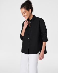 The classic button-down just got a whole lot more luxurious. Crafted from premium cotton with a super-fine yarn count, this lightweight yet durable fabric is perfect for year-round wear. Plus, it’s machine washable for easy maintenance. Designed with an oversized fit and high-low shirttail hem for the perfect amount of coverage, it looks great whether tucked or untucked. Pair it with any of our pants to instantly elevate your look. | Spanx Women's Poplin Oversized Button-Down Top Button Down Shirt Untucked Women, Untucked Shirts Women, Tuck Or Untuck Shirt Women, Oversized Button Down Shirt, Fashion Capsule Wardrobe, Fashion Capsule, Fine Yarn, Oversized Shirt, Capsule Wardrobe