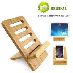 a wooden phone holder with two cell phones on it and an iphone in the background