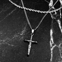 The strong symbol of sacrifice has long inspired the fashion world, earning a place in every style lover's collection. Crucifix Pendant Necklace made of 316L stainless steel, high polished and shinny on both sides of cross. 316L Stainless Steel Pendant Silver Link Chain Included Crucifix Pendant Design Reinforced Lobster Clasp Water, Sweat and Heat Resistant No Discoloring or Tarnishing Hypoallergenic - No Green Skin Pendant Size: 1.6" Spiritual Silver Stainless Steel Cross Necklace, Silver Stainless Steel Cross Necklace, Engraved Silver Stainless Steel Cross Necklace, Silver Crucifix Stainless Steel Jewelry, Silver Stainless Steel Crucifix Jewelry, Symbol Of Sacrifice, Strong Symbol, Green Skin, Silver Link Chain