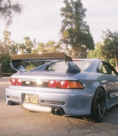 the back end of a silver sports car