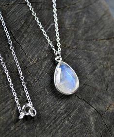 Amazing genuine moonstone necklace in sterling silver 925! Moonstone is a rare gemstone that is known for its optical effect that gives the impression of lunar light floating on water known as adularescence!  A stone for new beginnings, Moonstone is a stone of inner growth and strength. This beautiful moonstone gemstone is June's birthstone and a highly protective stone! Moonstone has been used in jewelry for millennia, including ancient civilizations. The Romans admired moonstone, as they believed it was born from solidified rays of the Moon! ▶ Matching earrings: https://etsy.me/2P60Nzp ▶ The moonstone pendant measures approximately 17mm / 0.67 " (small).  ▶ You can choose the length of your chain from 15 inches to 26 inches.  Please have in mind that these are real stones, so each moonst Necklaces Silver, Rainbow Moonstone Pendant, June Birthstone, Rare Gemstones, Moonstone Necklace, Moonstone Jewelry, Moonstone Pendant, Fantasy Jewelry, Keep Jewelry