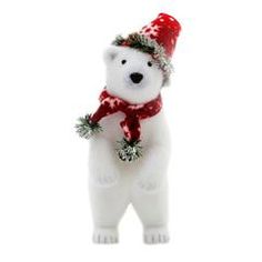 a white polar bear ornament with a red hat and scarf