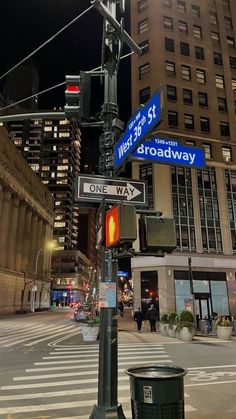 a street sign on the corner of broadway and west 34th