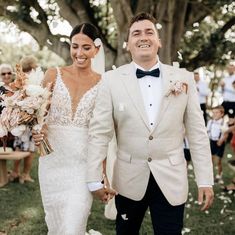 a newly married couple walking down the aisle