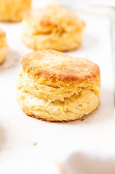 some biscuits are sitting on a baking sheet