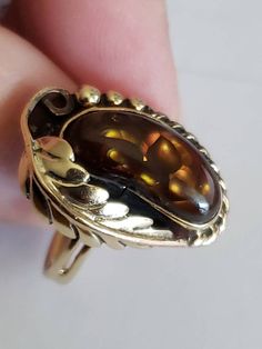 "Rare native american inspired design in 14k with a stunning fire agate stone. With a classic leaf and beaded setting, this fire agate ring is one of a kind unique. Size 4 1/2 *Can be sized, just message us prior to purchase Not marked, tested 14k Stone measures 16.15mm by 7.10mm Signed with \"B\" Vintage good condition" Fire Agate Ring, Celtic Braid, Navajo Style, Fire Agate, Handcrafted Rings, Agate Ring, Gorgeous Bracelet, Red Stone, Pendant Design