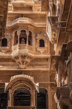 an ornate building with many balconies and windows