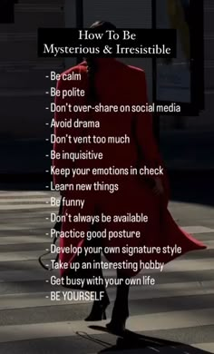 a woman in a red coat is walking down the street