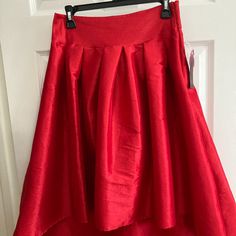 Silhouette Nyc - Red Skirt. Size Large But Fits More Like A 6-8. Has A Side Zipper. Longer In Front And Has A Bow Tie On The Back. Thick Material - Does Not List The Content Of The Fabric On The Tag Red Maxi Skirt For Summer Evenings, Red Summer Evening Maxi Skirt, Red Pleated Long Skirt, Red A-line Skirt For Formal Occasions, Formal Full Skirt In Red, Red Maxi Skirt For Spring Evening, Red Formal Skirt For Summer, Formal Red Full Skirt, Formal Red A-line Skirt