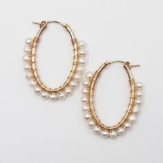 These oval hoops are lightweight, stylish, and so elegant. 14 K. Gold Fill Handwrapped 4 mm. Freshwater Pearls Elegant Pearl Wire Wrapped Hoop Earrings, Elegant Hand Wrapped 14k Gold Filled Earrings, Timeless Style, Fresh Water, Freshwater Pearls, Gold Filled, Timeless Fashion, Gold Bracelet, Hoop Earrings