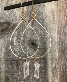 Handmade by Quinn Sharp Jewelry Designs in Humbolt County, CA, these hoops are made with 14kt gold filled wire. Hand-shaped and hammered. A natural Pink Crystal Drop hangs from the bottom of each hoop. Dimensions: Approx. 3" long including ear wire Everyday Handmade Teardrop Crystal Earrings, Handmade Pink Teardrop Hoop Earrings, Sharp Jewelry, Pink Wire Wrapped Teardrop Earrings, Handmade 14k Gold-filled Teardrop Earrings, Pink Teardrop Crystal Earrings, Teardrop Hoop Earrings, Cat Lady Gift, Paper Gift Tags