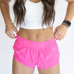 Ideal for dance, gym, running, outdoor sports, and casual wear, our Cheeky Chic Athletic Shorts are designed to keep you moving with ease and style. These shorts sit comfortably below the natural waist, featuring a silky, airy fabric with a breathable liner to ensure you stay cool and comfortable. Adjustable Drawstring: Achieve your desired fit with ease. Built-in Brief: Provides additional coverage and support. Reflective Detail: Enhances visibility for outdoor activities in low light. Light & Solid Color Athletic Shorts For Yoga In Spring, Solid Athletic Shorts For Yoga In Spring, Solid Athletic Shorts For Spring Yoga, Spring Activewear With Elastic Waistband For Training, Spring Activewear For Training With Elastic Waistband, Summer Running Bottoms With Elastic Waistband, Elastic Waistband Bottoms For Running In Summer, Athletic Shorts With Elastic Waistband For Training, Sporty Yoga Athletic Shorts With Elastic Waistband