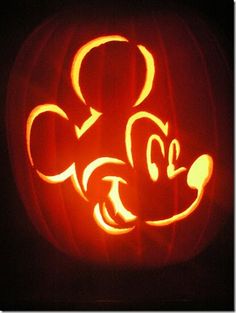 a pumpkin carved to look like mickey mouse