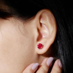 Product Details Adorn yourself with this solitaire floral earring, featuring a round-shaped created ruby solitaire in a floral setting. Perfect for simple and understated looks, this solitaire stud earring makes for a beautiful piece of fine jewelry. Ideal for everyday wear or special occasions. Product Information SKU SHP-EARRINGS062194458 Length 6.8 mm Width 6.8 mm Weight 0.96 gm (Approximate) LAB CREATED RUBY INFORMATION No.of Stones 2 Pieces Total Weight 2.74 Carat (Approximate) Dimension(ap Floral Earring, Ruby Earrings Studs, Gem Earrings, Solitaire Studs, Ruby Earrings, Signature Jewelry, Timeless Jewelry, Floral Earrings, Conflict Free Diamonds