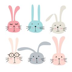 four rabbits in different colors and sizes, with their faces drawn to look like they are smiling