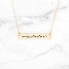 Wanderlust - Gold Quote Bar Necklace If you're a wayfaring princess, a fan of the great outdoors, a road trip junkie, or a frequent flyer, then this beautiful gold Wanderlust necklace is for you! This dainty bar necklace is the perfect accessory to wear on its own or to layer with other lovely chains. This makes the perfect gift for a birthday, anniversary, Valentine's Day, Christmas, a Graduation, or just because! This pretty Wanderlust necklace is perfect for the wanderer or adventure seeker! Gold Bar Necklace Engraved, Rose Gold Quotes, Silver Quotes, Dainty Bar Necklace, Wanderlust Necklace, Gold Bar Necklace Personalized, Horizontal Bar Necklace, Rose Gold Bar, Engraved Bar Necklace