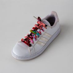 What a fun way to jazz up your kicks! Grab a pair of our colorful, handmade Liberian Shoelaces and add a little spark to your walk. Details: 100% cotton 45" L Metal aglet ends Licorice, Shoe Laces, Caramel, Walking